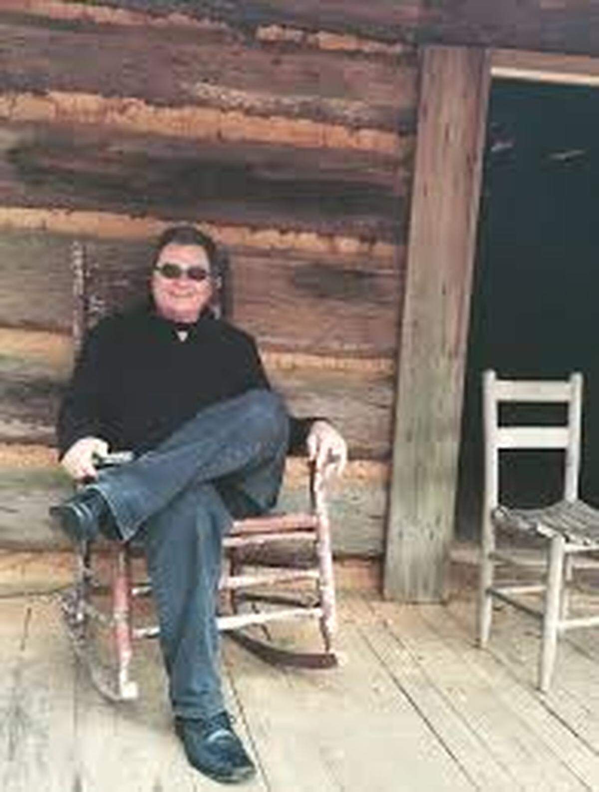 Greg Cote Show podcast host Greg Cote, pictured on vacation after hiking in dress shoes, is given a suerprise birthday party in the new episode.
