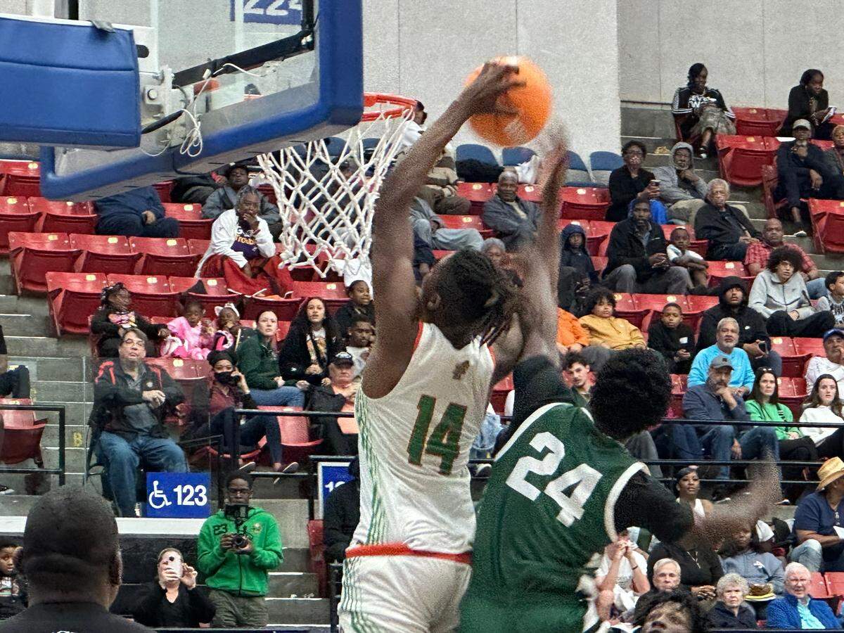 Blanche Ely’s Kaleb Corbitt (14) battles for a rebound during Wednesday’s Class 5A state semifinal against St. Petersburg at the RP Funding Center in Lakeland, Fla.