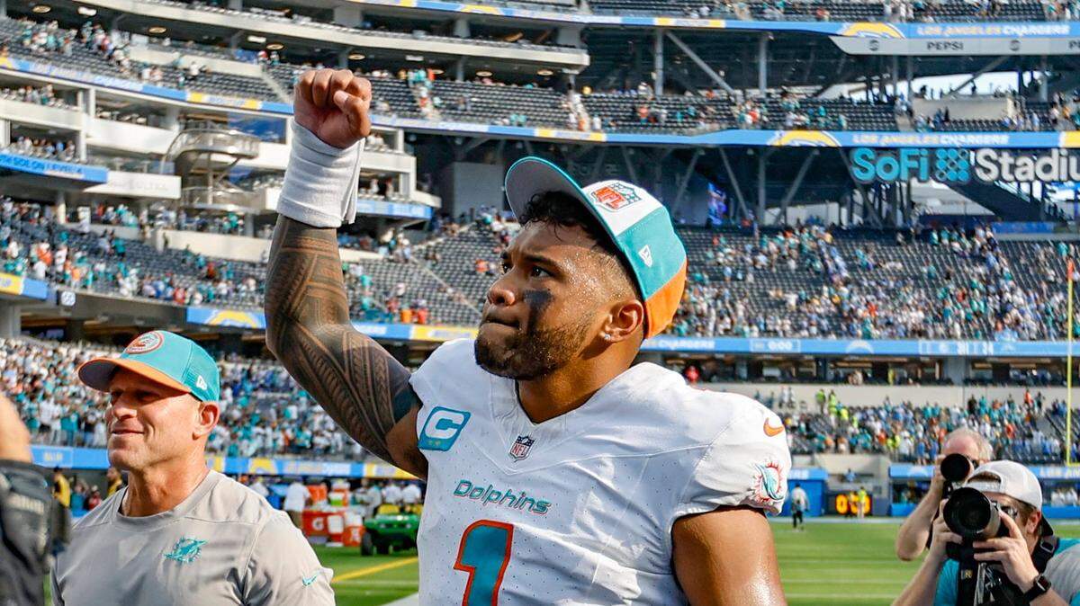 Miami Dolphins quarterback Tua Tagovailoa (1) reacts to the crowd after the Dolphins defeat the Los Angeles Chargers at SoFi Stadium in Inglewood, California on Sunday, September 10, 2023.