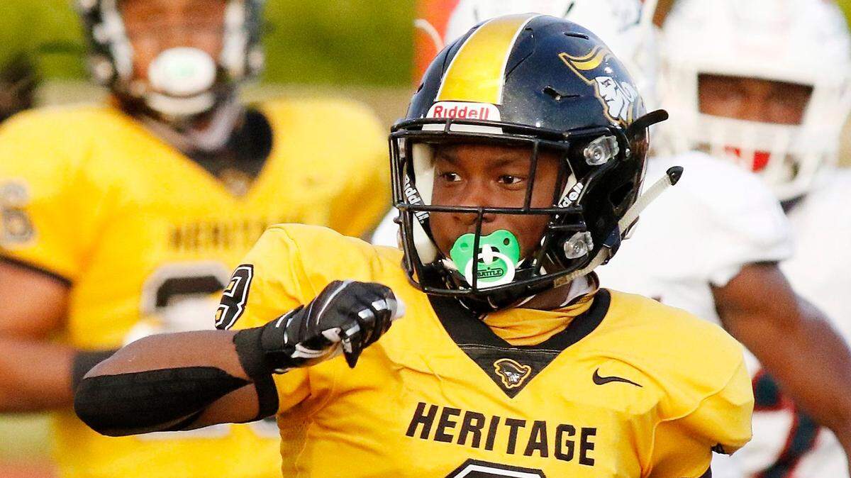 American Heritage Patriots wide receiver Vinson Davis (3) carries the ball against Chaminade-Madonna Lions during the football game Friday, September 17, 2020 in Hollywood