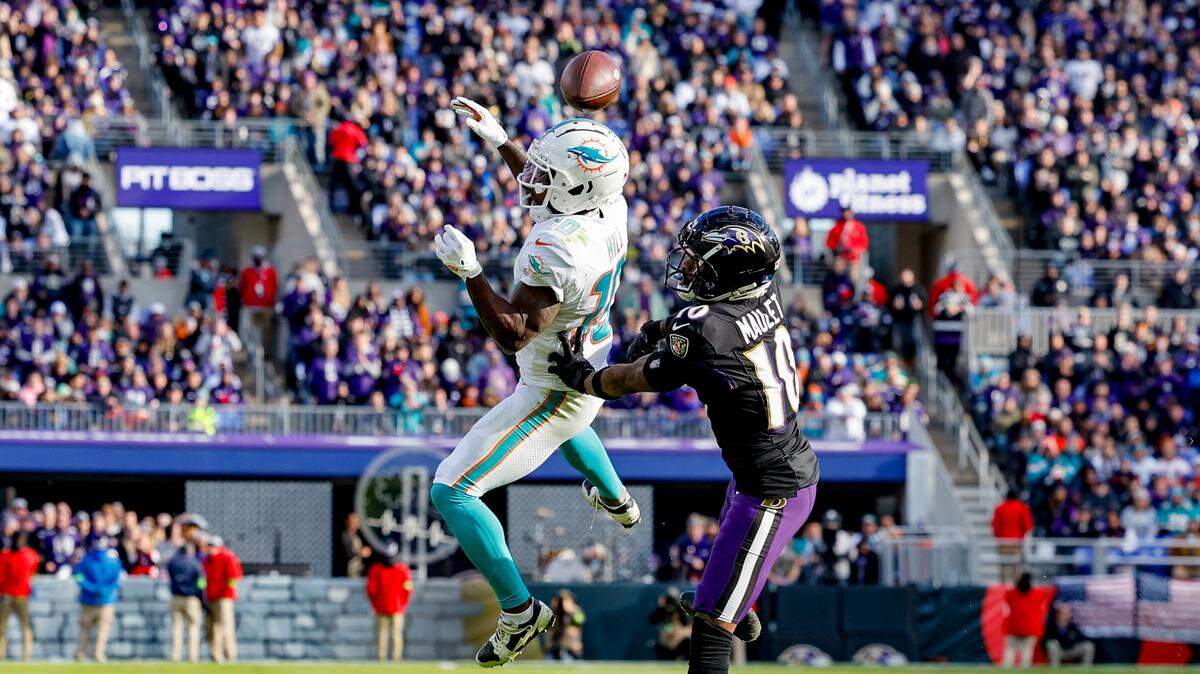 Miami Dolphins wide receiver Tyreek Hill (10) is unable to catch as Baltimore Ravens cornerback Arthur Maulet (10) defends during first half of an NFL football game at M&T Bank Stadium in Baltimore, Maryland on Sunday, December 31, 2023.