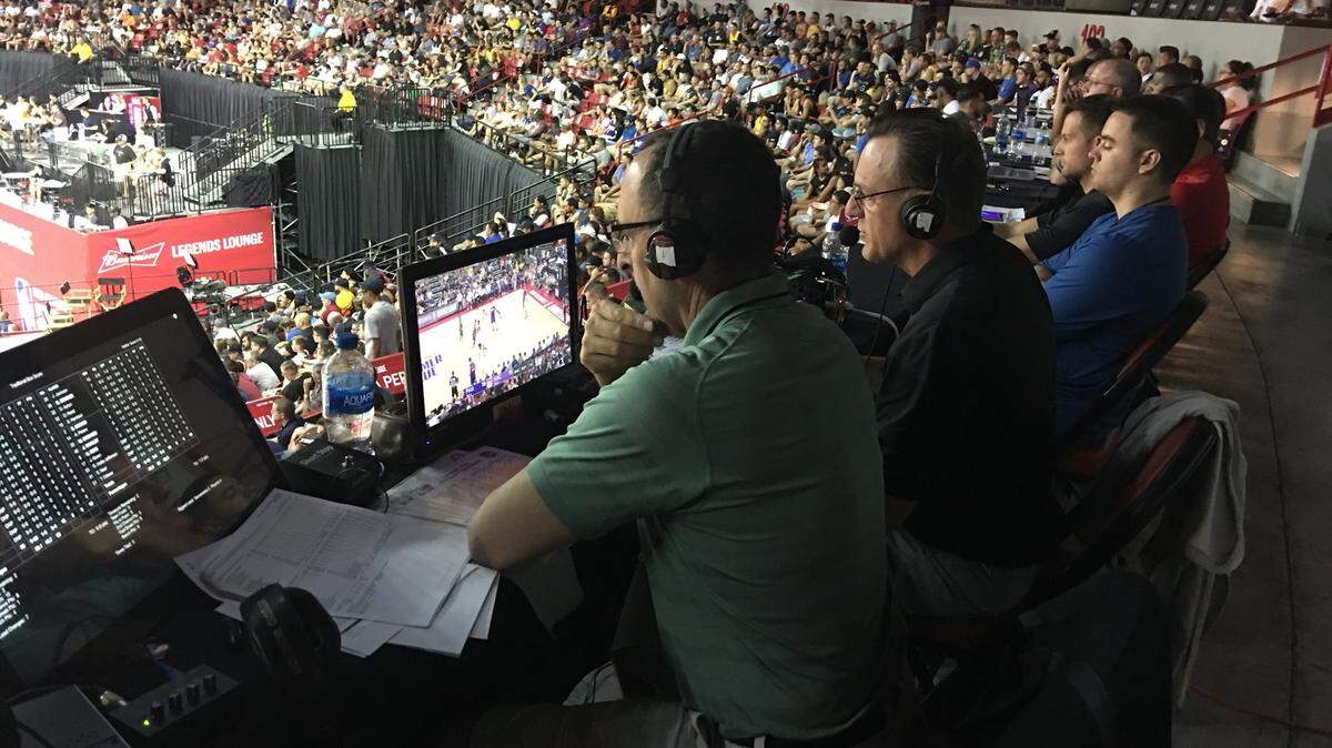 Miami Heat broadcasters Eric Reid and John Crotty practice their craft during a game between the Sacramento Kings and Phoenix Suns summer league teams in Las Vegas on July 7, 2018.
