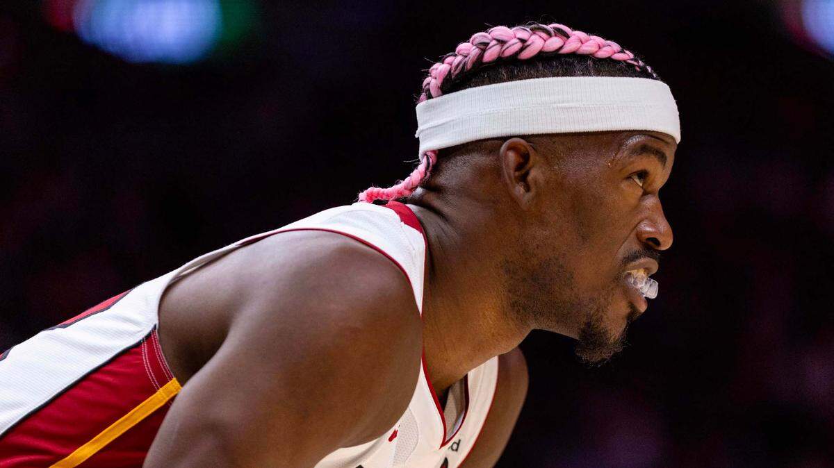 Miami Heat forward Jimmy Butler (22) reacts during the second half of an NBA game at the Kaseya Center on Wednesday, January 1, 2025, in Miami, Fla.
