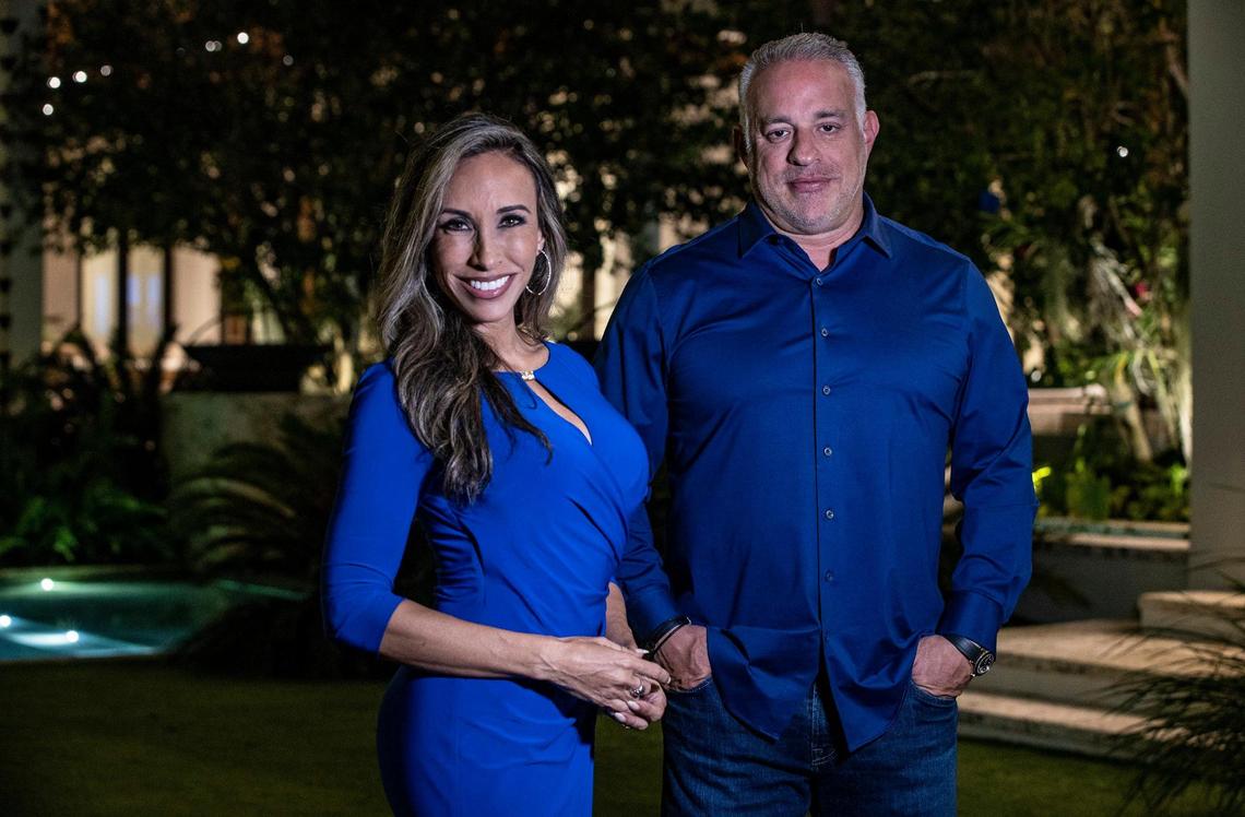 Diana Diaz, former TV anchor and co-chair of the UM Stadium Committee, and MSP Recovery CEO John H. Ruiz posed at Ruiz’s house in Coral Gables on Dec. 8, 2021. He wants to build a stadium for the University of Miami in Coral Gables.