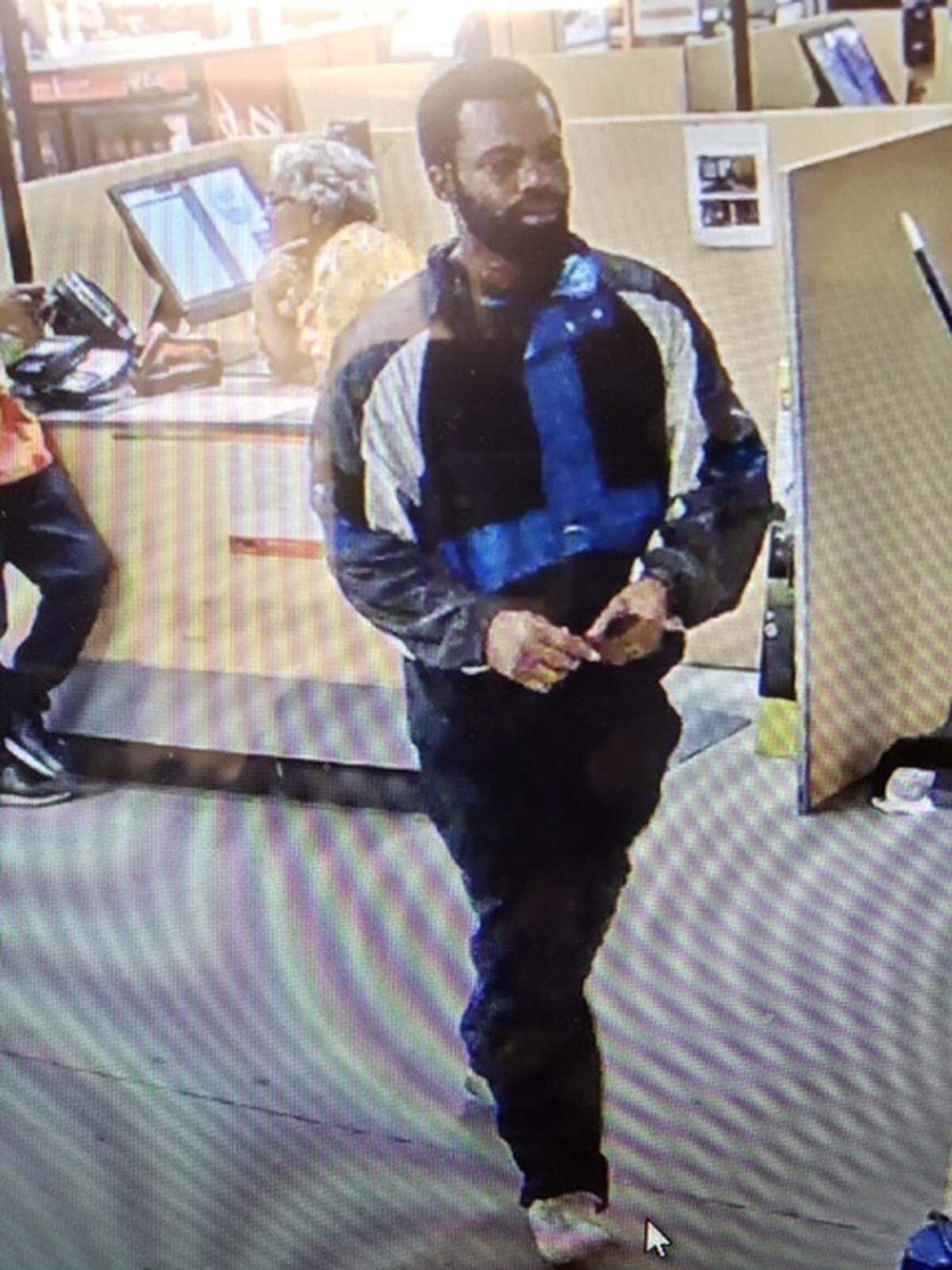The carjacking suspect in The Home Depot store on Monday.