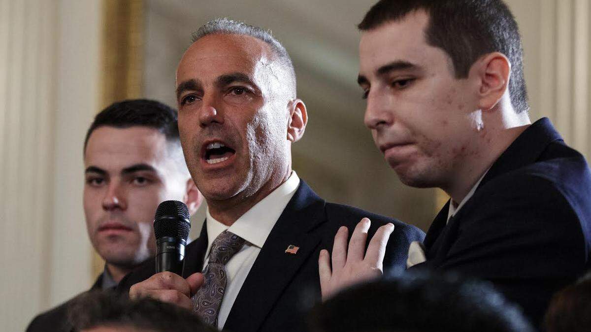 Andrew Pollack, father of slain Marjory Stoneman Douglas High School student Meadow Jade Pollack, joined by his sons, spoke during a listening session with President Donald Trump, high school students, teachers and others in the State Dining Room of the White House in Washington, Wednesday, Feb. 21, 2018.