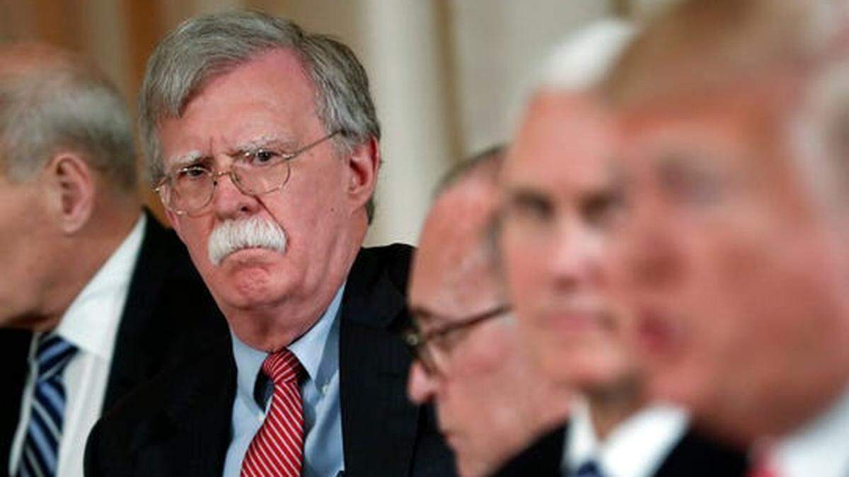 Former National Security Adviser John Bolton says he offered to resign; President Trump says he was fired.