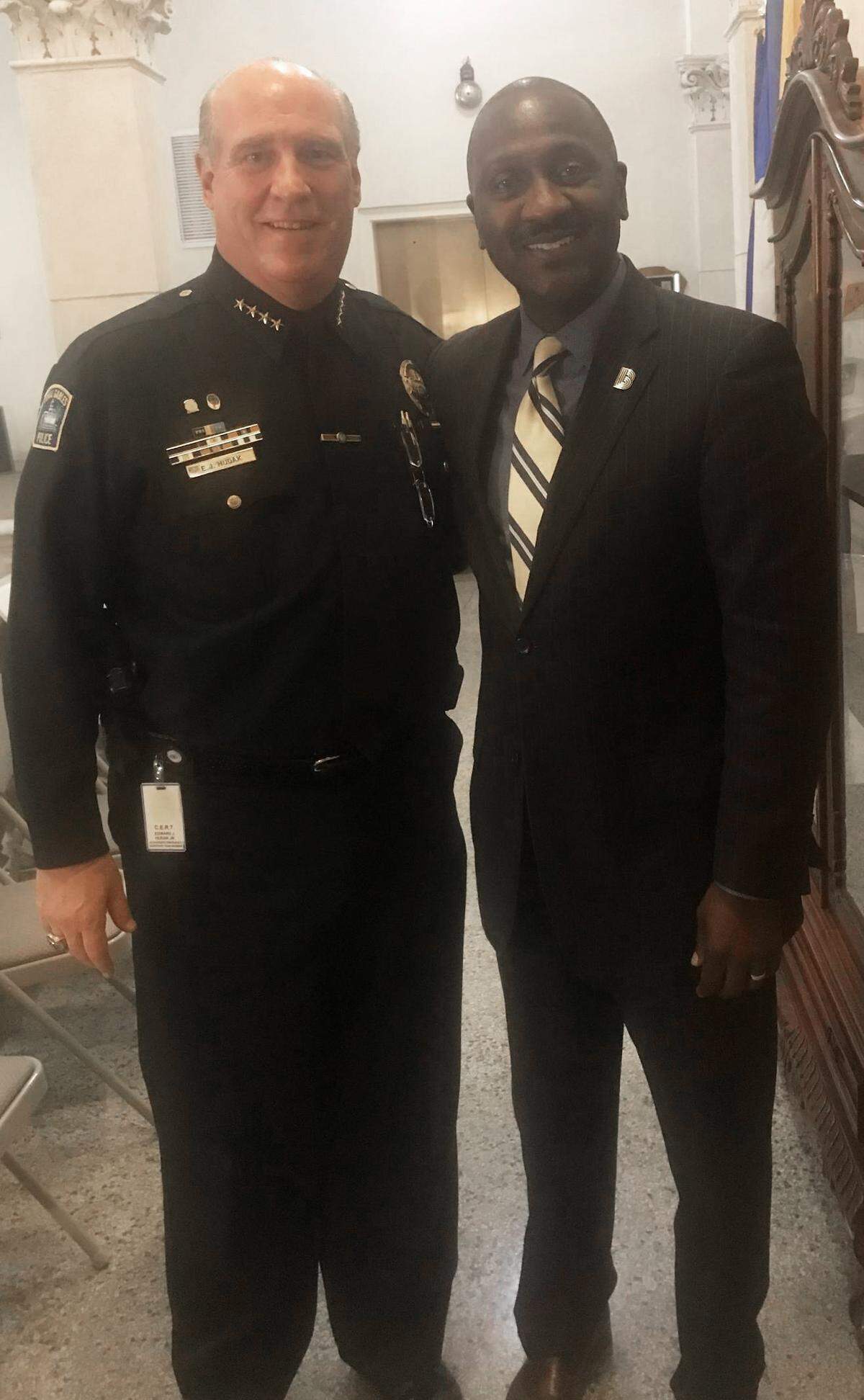 The Coral Gables Police Department is joining forces with Big Brothers Big Sisters of Miami to pair 20 at-risk youth at Carver Middle and Ponce de Leon Middle schools with mentors as part of the Bigs in Blue Mentoring Program. Pictured are Coral Gables Police Chief Ed Hudak, left, and Big Brothers Big Sisters of Miami President and CEO Gale Nelson.