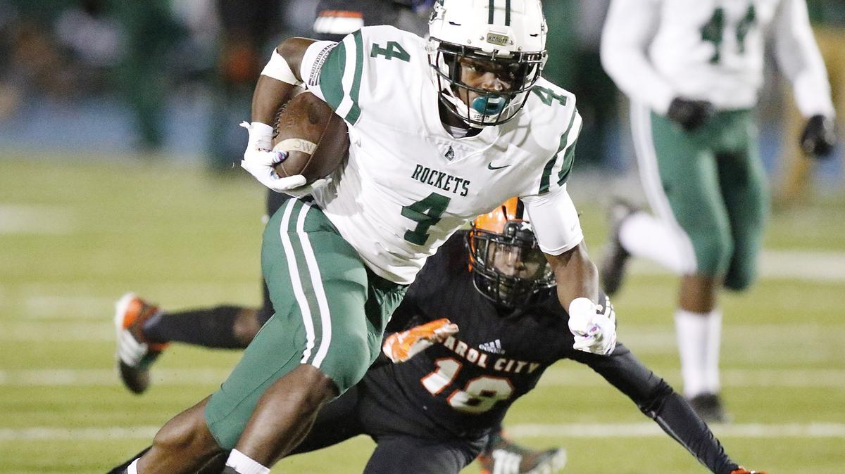 Miami Central Rockets running back Lexington Joseph carries the ball against Carol City Chiefs’ during the Region 4-6A semifinal football game on Friday, Nov. 16, 2018 at Traz Powell Stadium in Miami