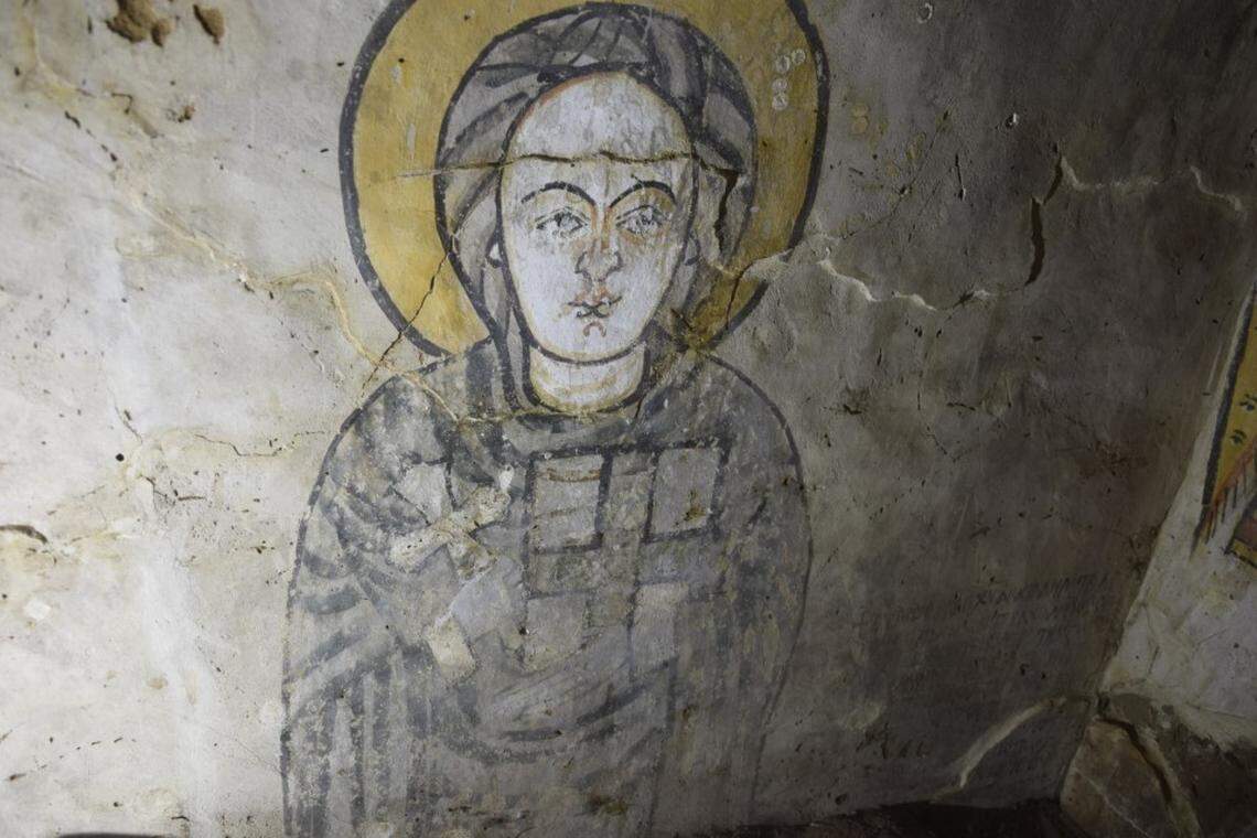 Painting of the Virgin Mary on the side wall of the chamber.