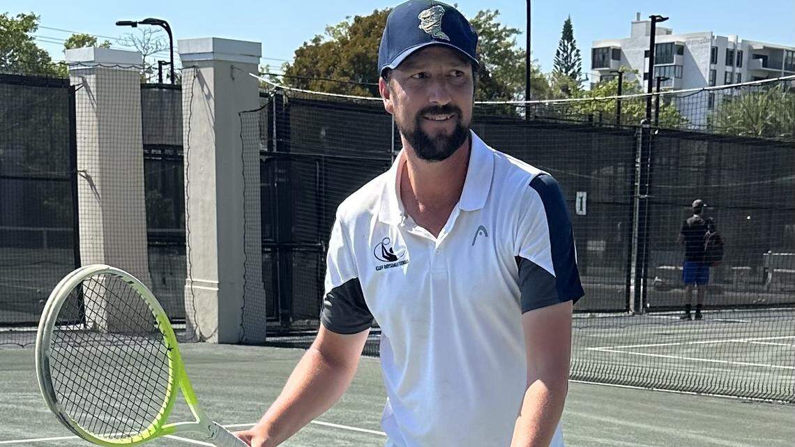 Carrollton tennis coach has come a long way … literally