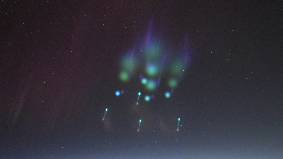 Yes, these clouds are real. They were formed when a four-stage rocket released vapor tracers 392 miles above Earth to help NASA measure winds in the upper atmosphere.