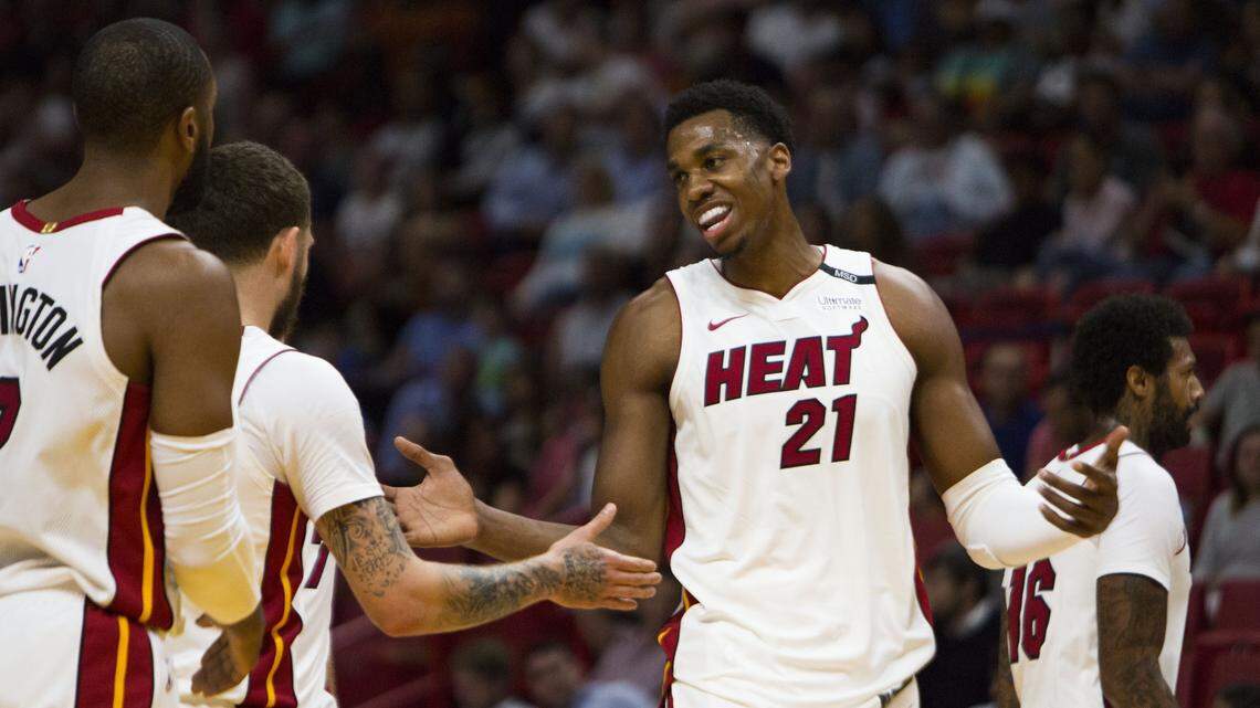 Miami Heat center Hassan Whiteside (21) reacts to a play during the first quarter of an NBA basketball game against the Atlanta Hawks at AmericanAirlines Arena in Miami on April 3, 2018.