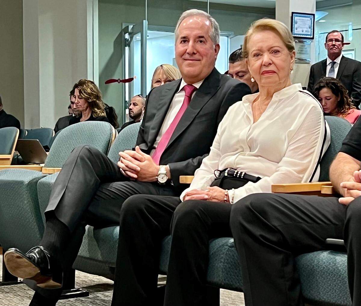 Jorge Mas and his mother, Irma Santos-Espronceda, listen to commissioners speak about naming a future park after Jorge Mas Canosa at Miami City Hall on Thursday, Sept. 22, 2022.