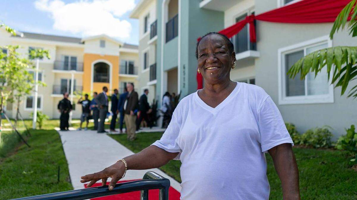 Sharon Gregory, 63 and a 17-year resident, is the first resident to be move into new Liberty Square Rising apartment.