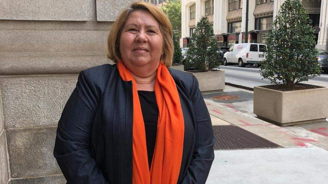 Yraida Guanipa of Miami stands outside the federal appeals court Wednesday morning in downtown Atlanta, July 25, 2018.
