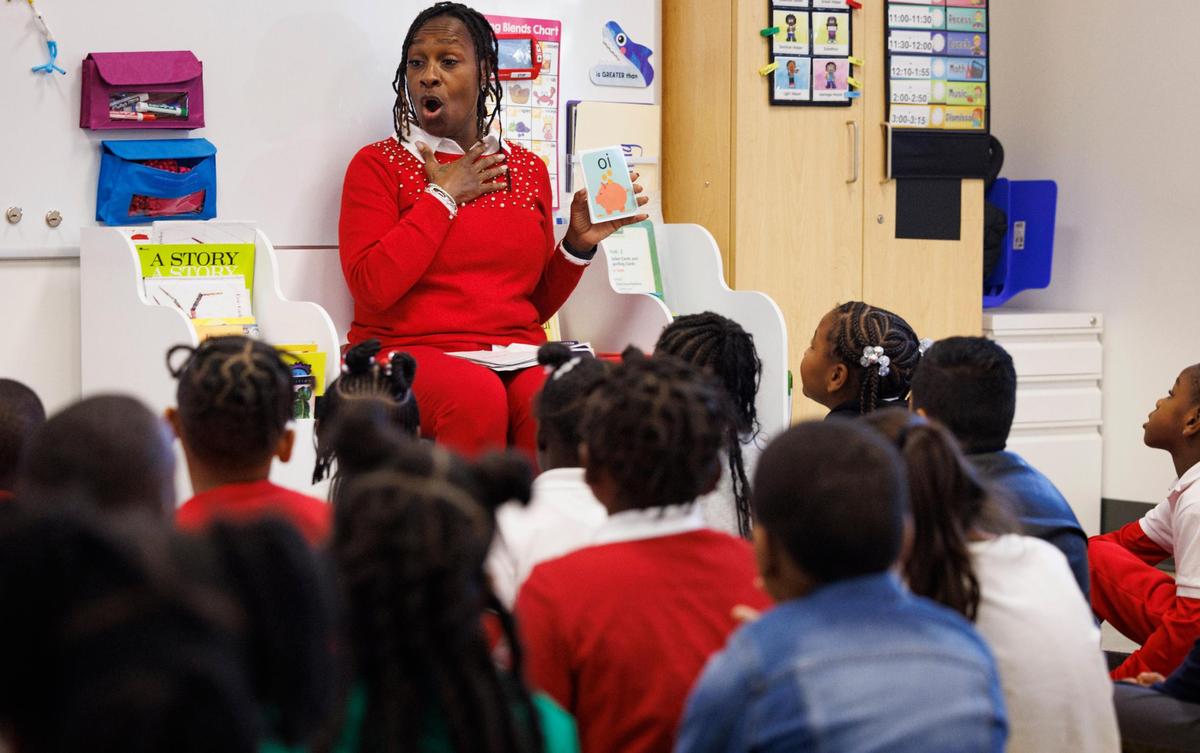 Apryl Shackleford, microschool leader and teacher, goes through sounds with the kindergarten to second graders during the school day on Thursday, Dec. 5, 2024, at Primer microschool, a new concept of school, in Liberty City.