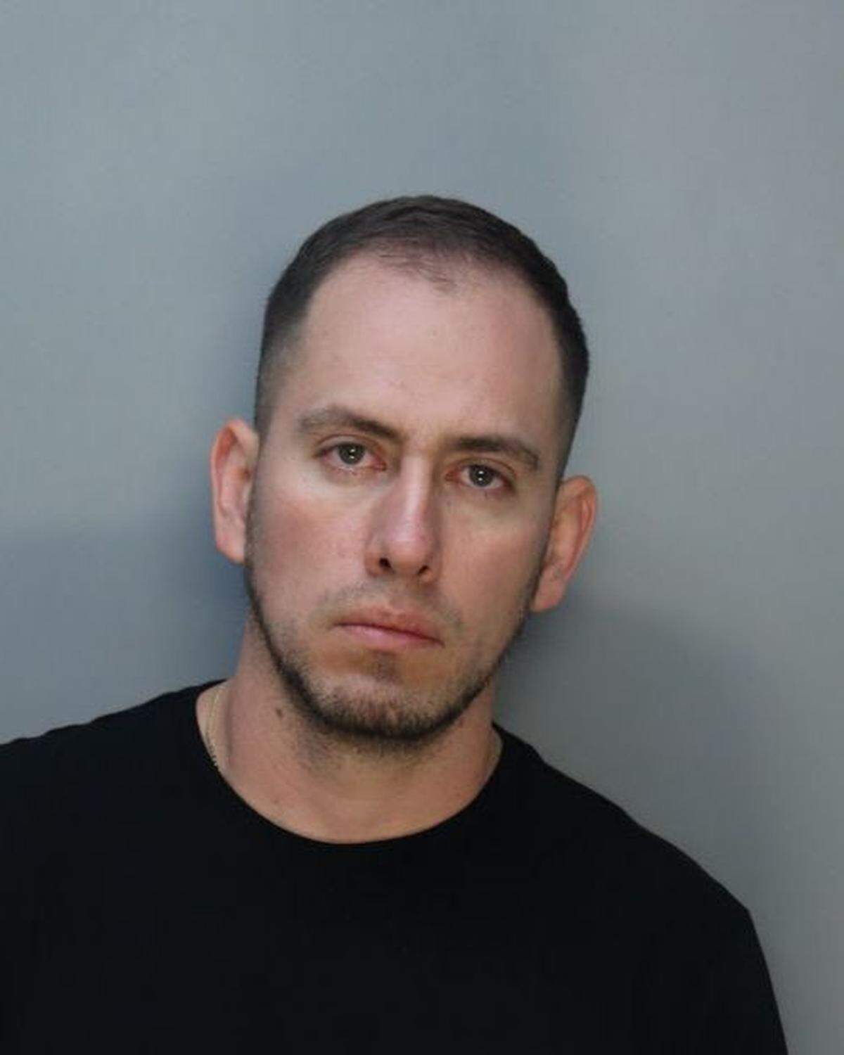 Mugshot of Miami-Dade Officer Miguel Lomeli, 32. He is accused of kidnapping and sexually assaulting his ex-girlfriend on Wednesday, Dec. 6, 2023.