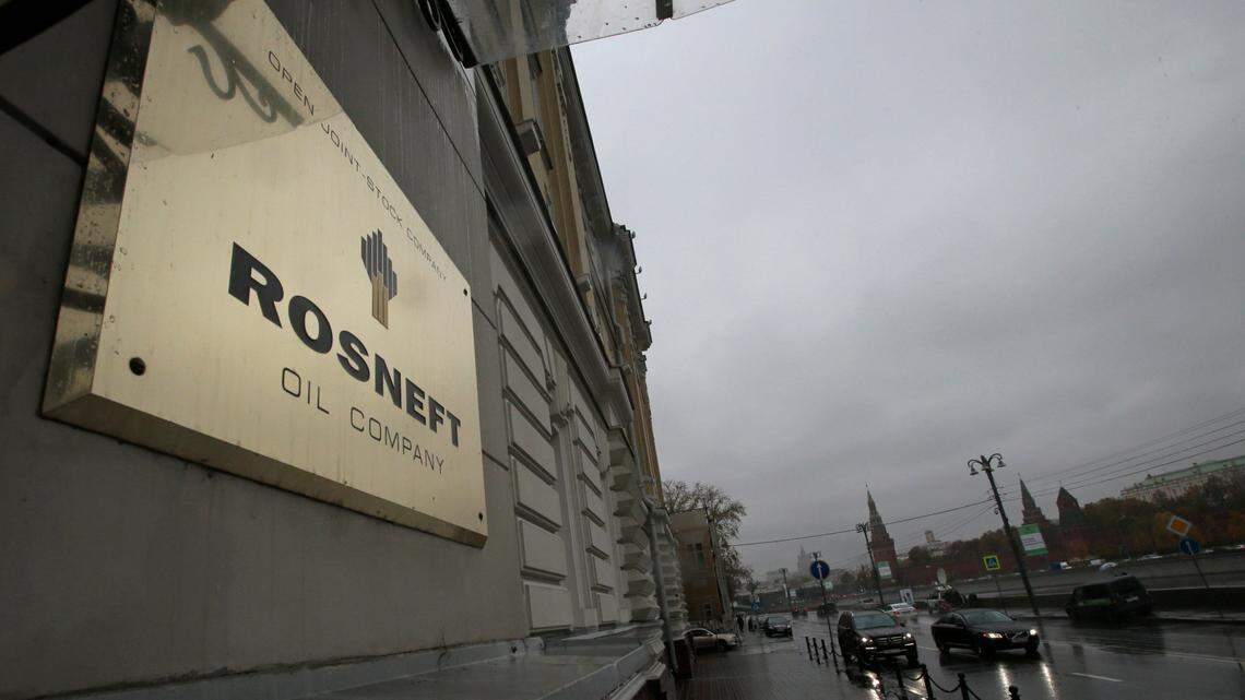 In this Oct. 18, 2012 file photo, a plaque of Rosneft is seen outside its headquarters in Moscow. Rosneft, a state-owned Russian oil and gas company, is among the investments the state of Florida has in Russian companies.