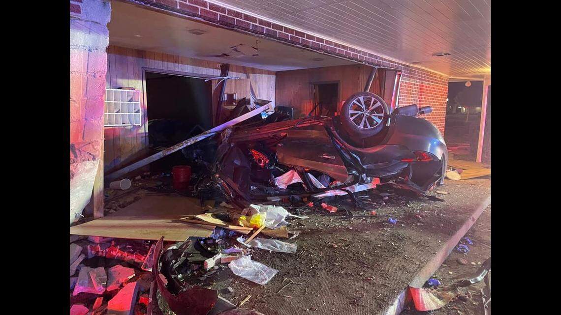 A Florida driver ended up inside a Presbyterian church when he missed a curve, flipped over and slid through the front doors, video released by the Crestview Police Department shows.