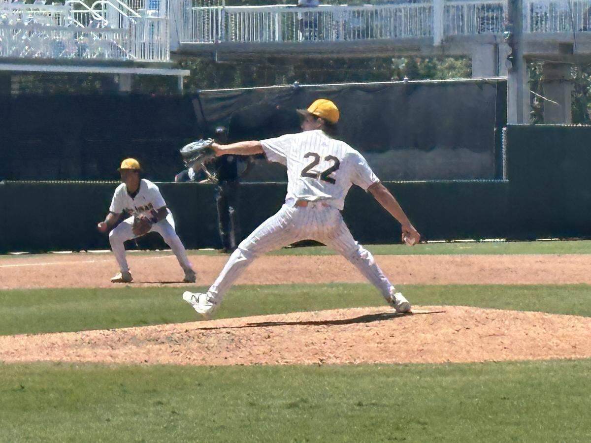 St. Thomas Aquinas pitcher Julian Diaz throws a pitch against Land O’Lakes in the Class 6A state baseball semifinal on Friday at Hammond Stadium in Fort Myers, Fla.