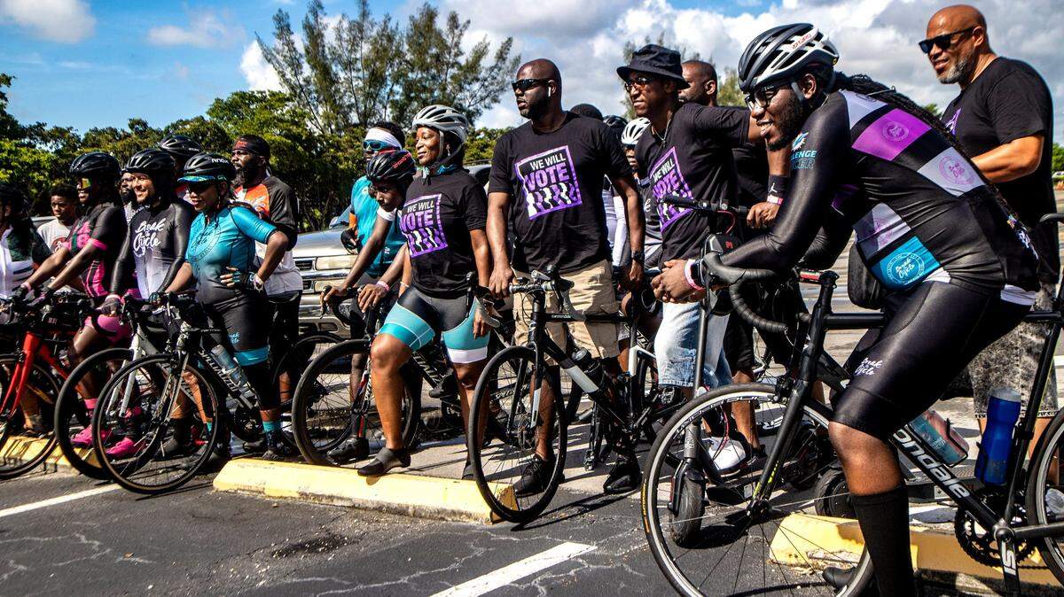Voters from churches and community organizations from Miami-Dade County gathered in the parking lot of the Calder Casino before biking over to the North Dade Regional Library in Miami Gardens as part of the “Souls to the Polls Caravan” 2022 on Aug. 20. Says Bea Hines: “The midterm election day is just days away. And I am concerned about the turnout and about those who are already saying that if they lose the election, it will be because of fraud.”