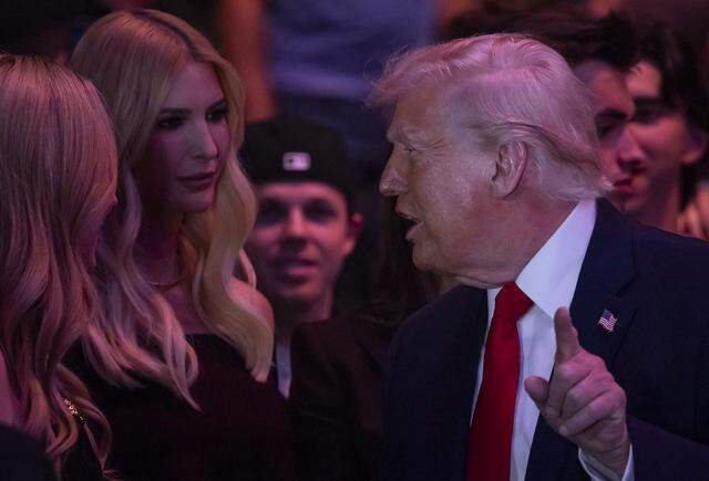 President Donald Trump talks with his daughter, Ivanka Trump, during UFC 327 at the Kaseya Center on Saturday, April 11, 2026, in downtown Miami, Fla.