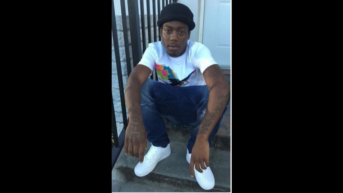 Tyron Arthus sits on the steps in this undated photo provided by the Broward Sheriff’s Office. He was killed Oct. 8, 2021, and detectives are looking for the person they say shot him.