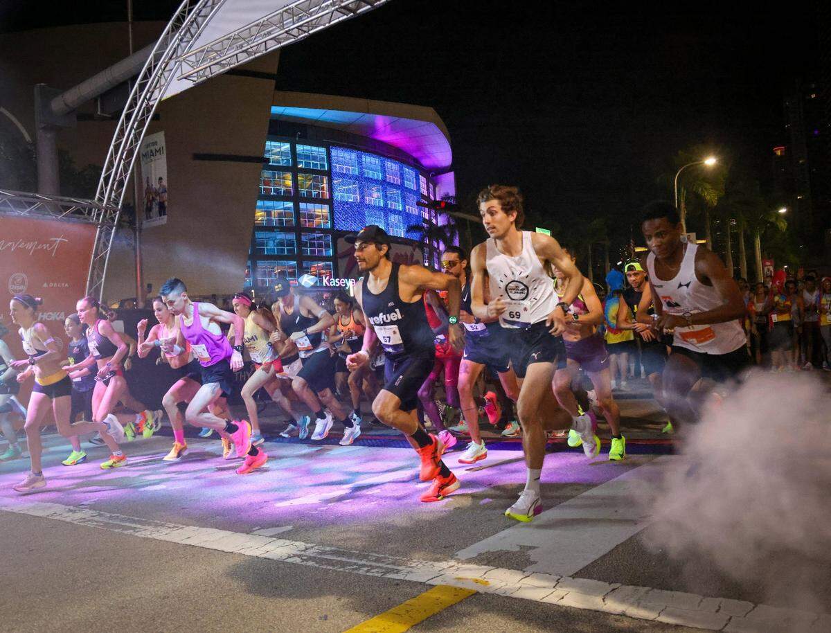 Elite runners launch out of the starting line as over 18,000 athletes and runners participated in the 2025 Life Time Miami Marathon and Half on Feb. 2, 2025, in downtown Miami, Florida.