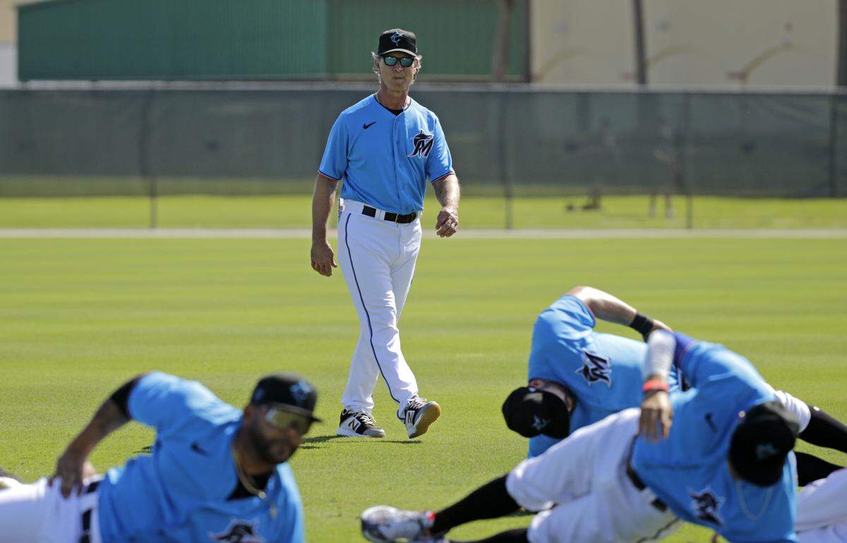 Miami Marlins manager Don Mattingly (8) looks on during the first full-squad spring training workout at Roger Dean Stadium on Monday, February 17, 2020 in Jupiter, FL.
