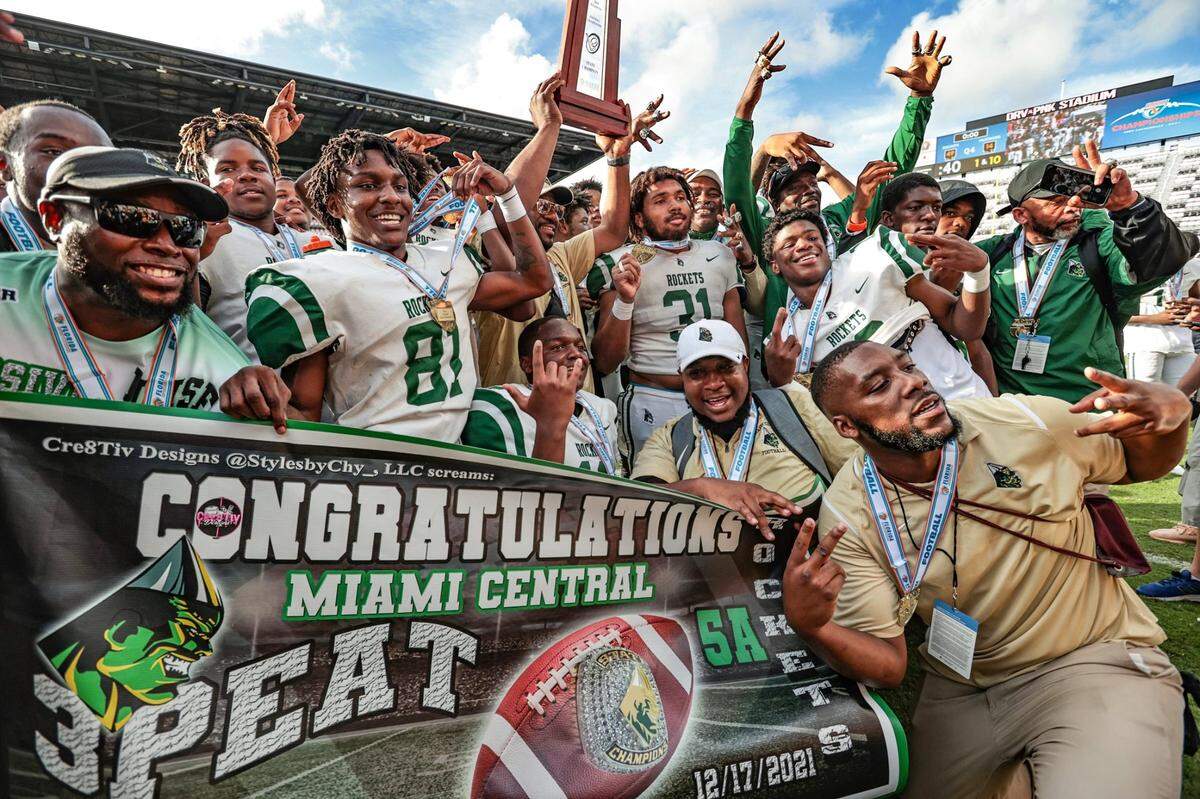 Miami Central High School celebrates after defeating Merritt Island High School in the FHSAA Class 5A State Championship at DRV PNK Stadium, in Fort Lauderdale on Friday, December 17, 2021.