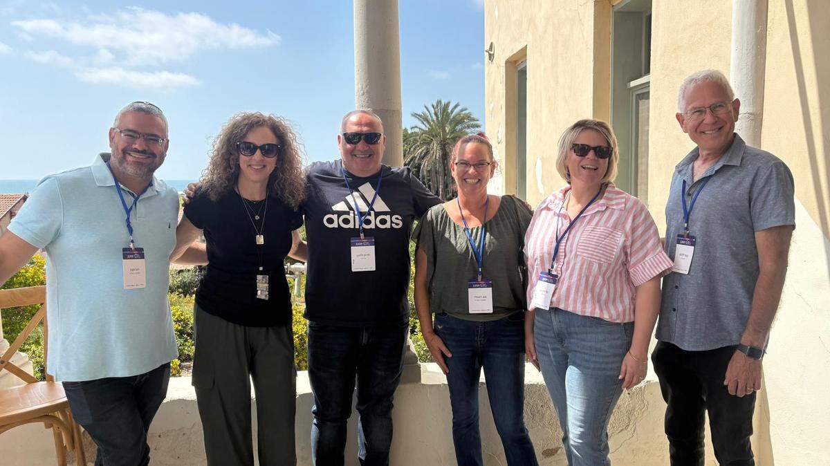 Dahlia Bendavid (second from left), 58, poses with colleagues and partners of the Greater Miami Jewish Federation.