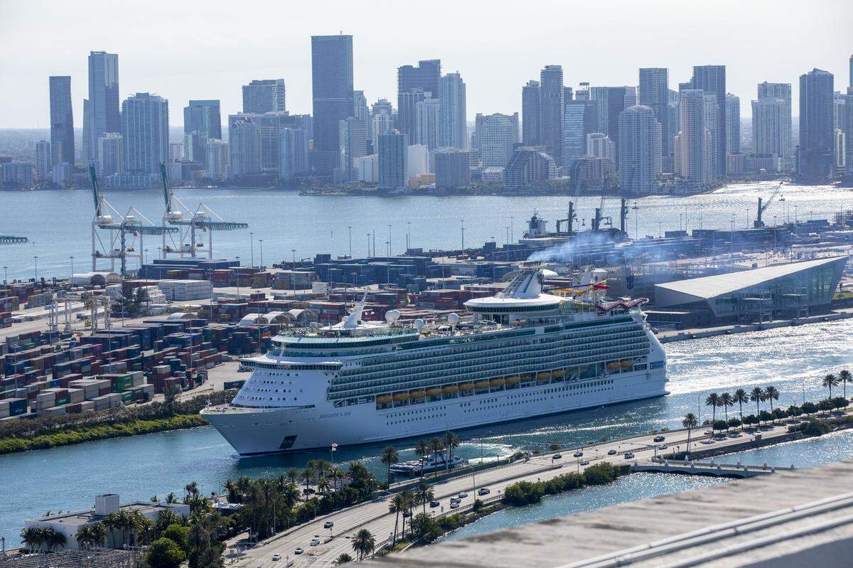 Royal Caribbean's Navigator of the Seas cruise ship exits government cut at Port of Miami in Miami, Florida on Monday, May 4, 2020.