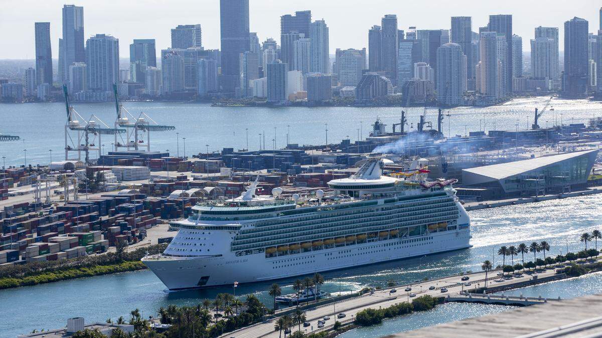 Royal Caribbean's Navigator of the Seas cruise ship exits government cut at Port of Miami in Miami, Florida on Monday, May 4, 2020.