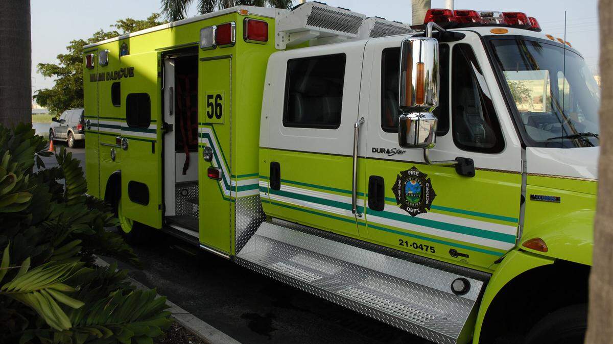 Eight Miami-Dade Fire Rescue units responded to a fire that left one person hospitalized and a dog dead.
