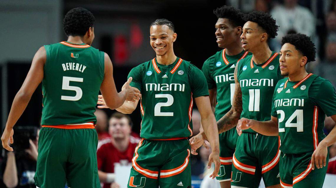 Mar 19, 2023; Albany, NY, USA; Miami (Fl) Hurricanes guard Isaiah Wong (2) high fives guard Harlond Beverly (5) after a play against the Indiana Hoosiers during the first half at MVP Arena. Mandatory Credit: David Butler II-USA TODAY Sports