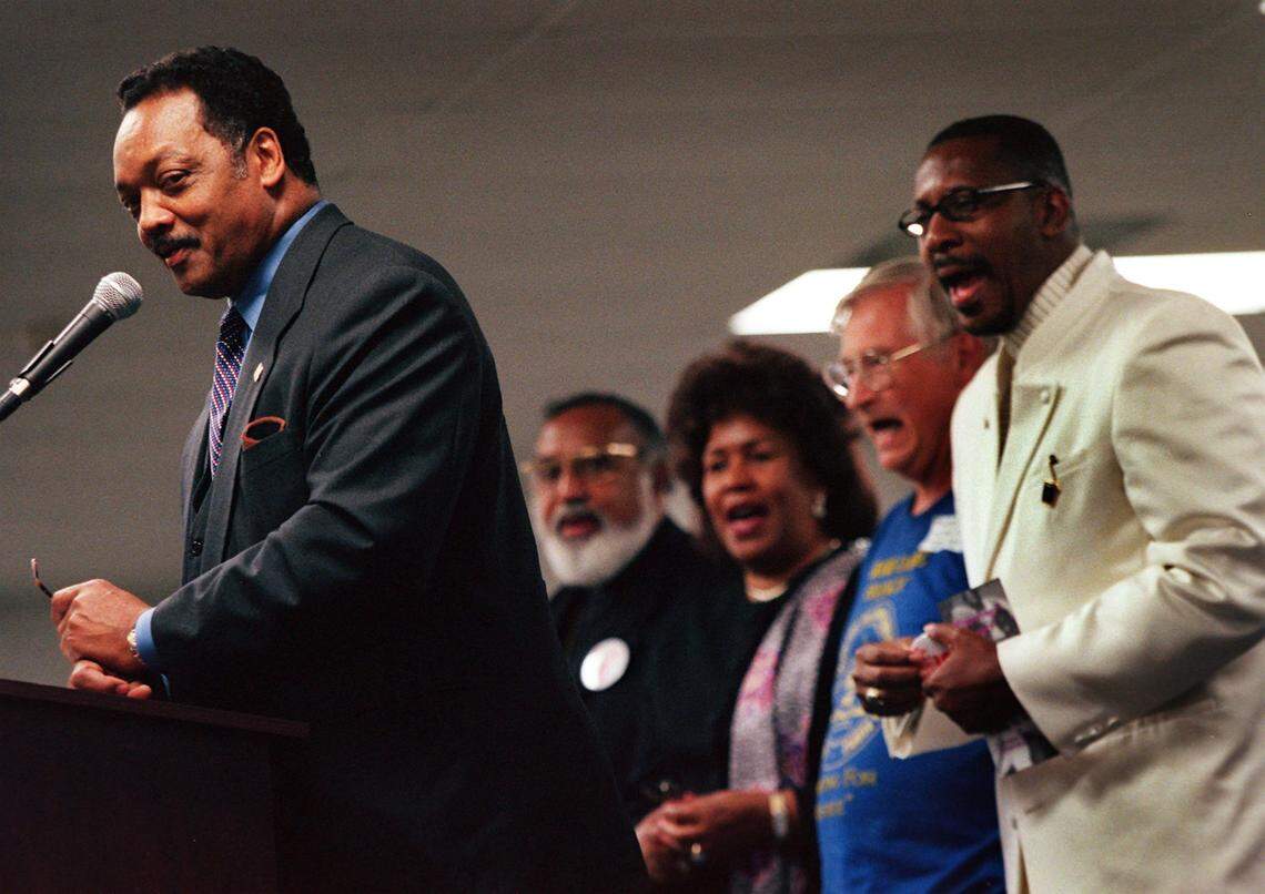 The Rev. Jesse Jackson addresses a group of potential voters at the New Birth Ministries and Miami-Dade Branch of the NAACP in 2000.