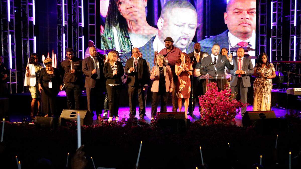 Pastor Gaston Smith leads the crowd in prayer at the 18th annual Reclaim the Dream Candlelight Memorial Service and Gospel Concert in Miami, Florida, on Tuesday, April 4, 2023. The memorial service was an opportunity to remember who King was and what he stood for.
