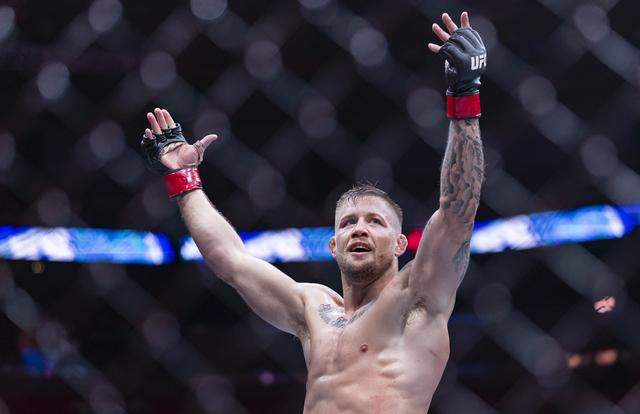 Charles Radtke of the United States reacts after defeating Francisco Prado of Argentina in their welterweight bout at UFC 327 at the Kaseya Center on Saturday, April 11, 2026, in downtown Miami, Fla.