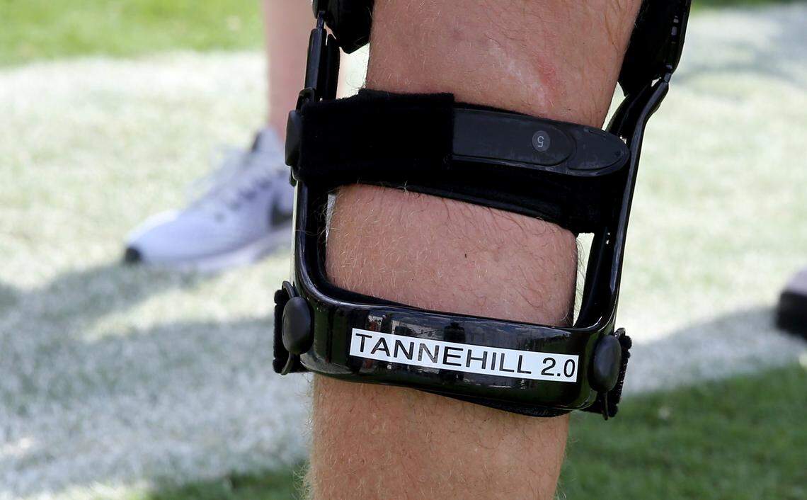 Miami Dolphins quarterback Ryan Tannehill’s leg brace during the first day of training camp at  Miami Dolphins training facility in Davie, Florida, July 26, 2018. 