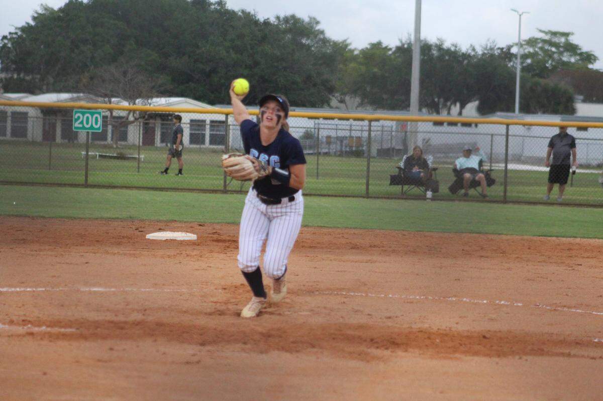 Coral Springs Charter’s Brianna Godfrey pitches against Cooper City in Thursday night’s BCAA Big 8 softball final at Pop Travers Park in Plantation.