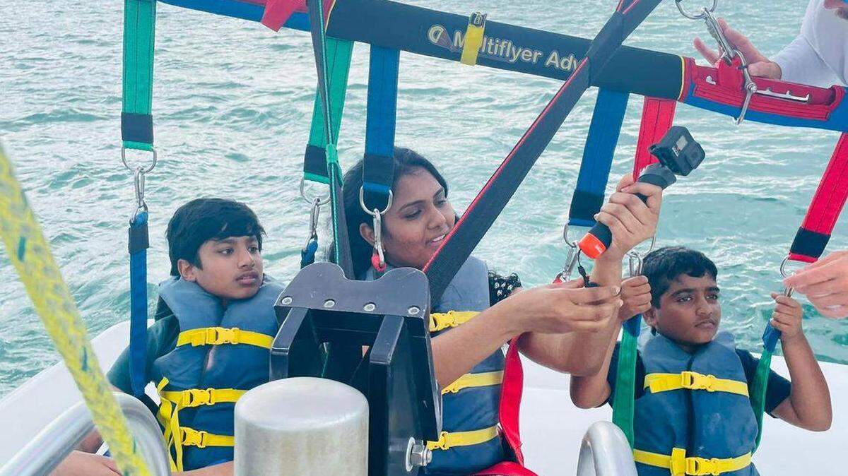 Supraja Alaparthi, center, died in a parasailing tragedy after a boat captain cut the parasailing cable tethering her to a vessel off the Florida Keys on May 30, 2022, according to authorities. Sriakshith Alaparthi, her 10-year-old son, left, and Vishant Sadda, her 9-year-old nephew, right, were also hurt but survived.