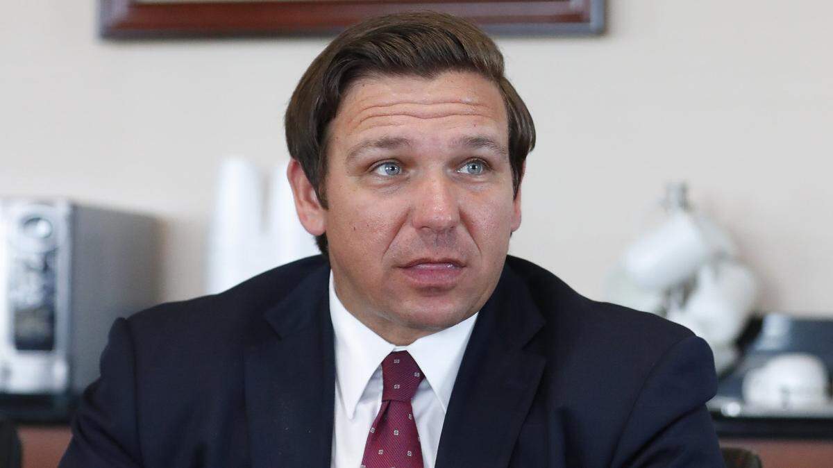 Florida Gov. Ron DeSantis, speaks with members of the Miccosukee Tribe of Indians General Council, Thursday, April 25, 2019, at the Miccosukee Village, West of Miami, in the Florida Everglades.