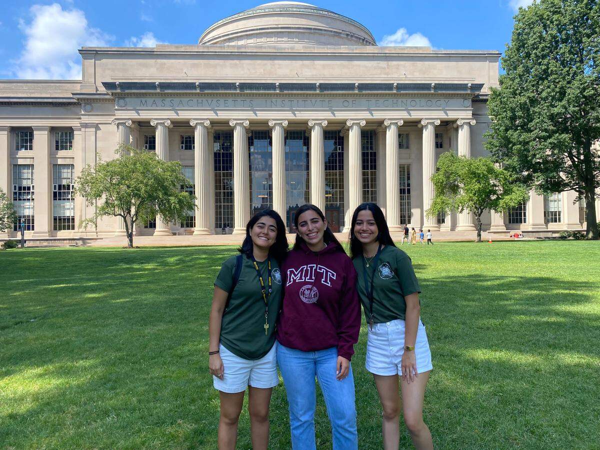 From left to right: Romina Cano Velasquez, Fabiana González Zambrano and Ana Camba Gomes, three recent graduates of the Honors College at Miami Dade College, on the MIT campus on Monday, Aug. 29, 2022. The three are among 21 students worldwide to be accepted as transfer students into the prestigious university in Cambridge, Massachusetts.