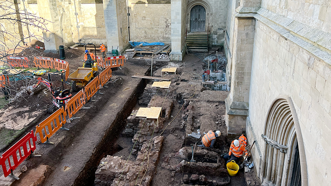 Archaeologists in Exeter found 1,900-year-old military barracks under Roman town house ruins during excavations at a cathedral, photos show.