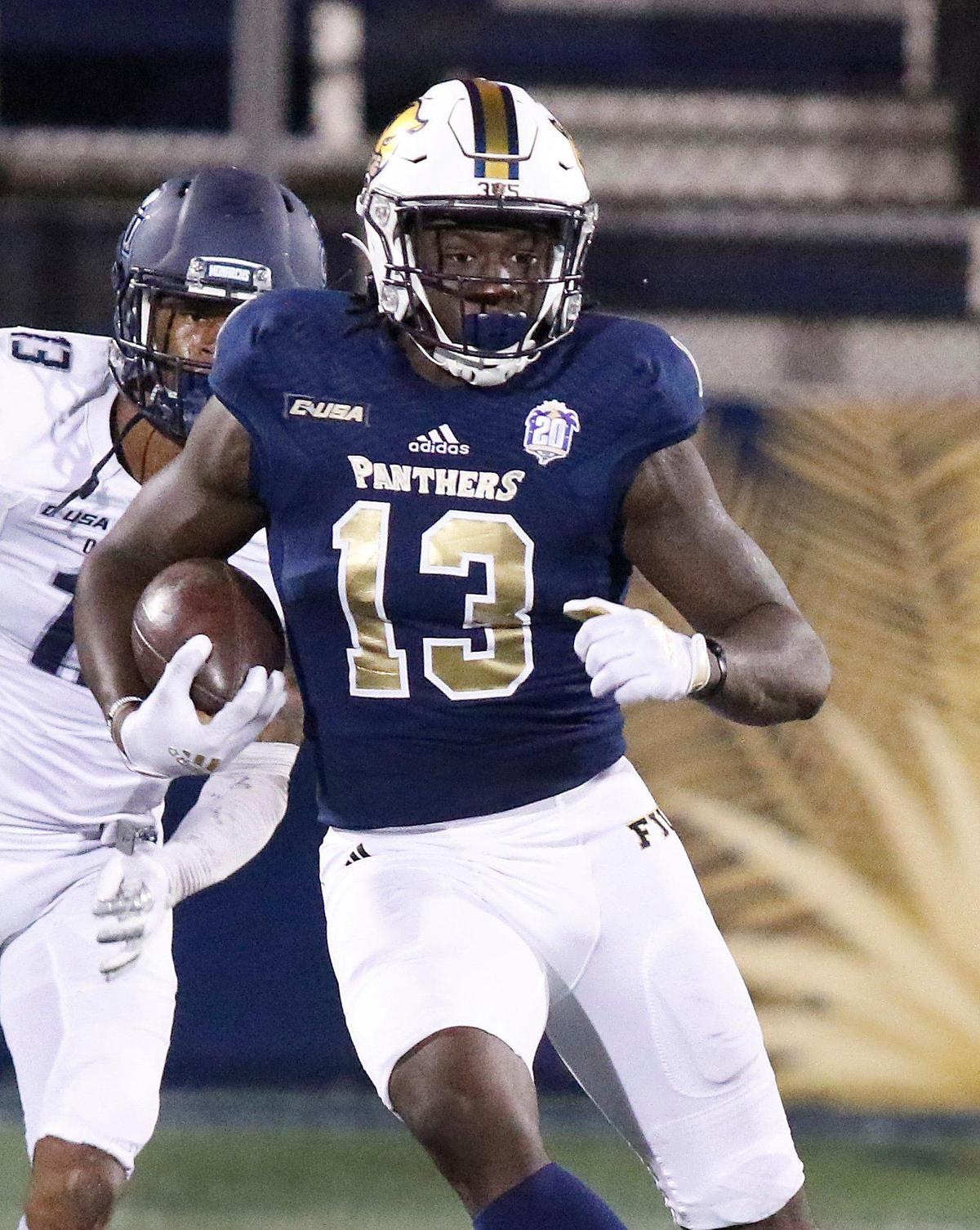 FIU Panthers Rivaldo Fairweather (13) plays against Old Dominion Monarshs during football game Saturday, Nov. 6, 2021 at Riccardo Silva Stadium in Miami. Andrew Uloza / for THE MIAMI HERALD