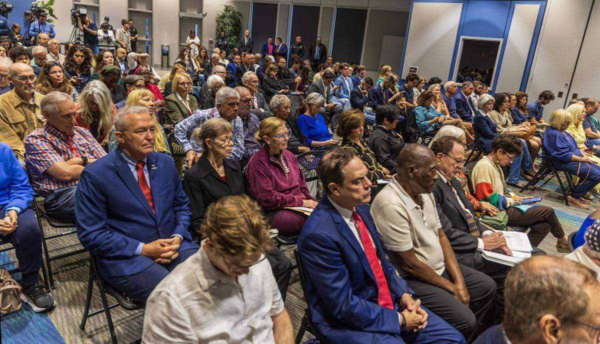 Attendees to the special board meeting, held by the Miami Dade College Board of Trustees to discuss the potential real estate transactions including the authorization to convey a +/-2.63 acre surface parking lot at the Wolfson Campus for further conveyance for a Presidential Library for Donald J. Trump, celebrated at the MDC Hialeah Campus, on Wednesday, December 02 , 2025.