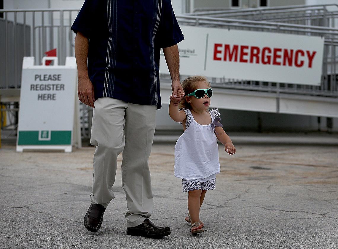 Iris Besil, 2, attends a press conference with her father, Adrian, on Monday, Sept. 10, 2018.  Her mom, Stephanie, delivered Iris’ baby brothers, Joaquin and Julian, at Baptist Hospital on Sept. 23, 2017, after evacuating from the Florida Keys before Irma hit. The family returned to Fishermen’s Community Hospital in Marathon on Monday to mark the storm’s one-year anniversary.