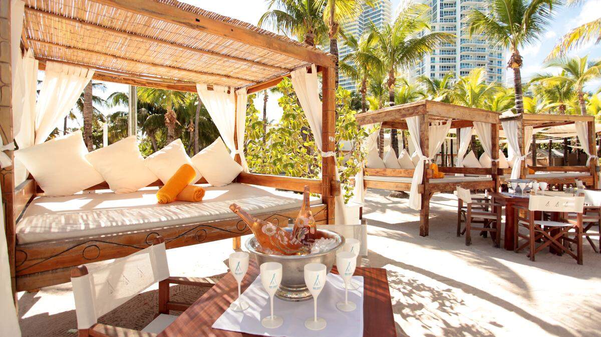You can live that lounging life on a day bed at the beach, thanks to Nikki Beach clubs all over the world.