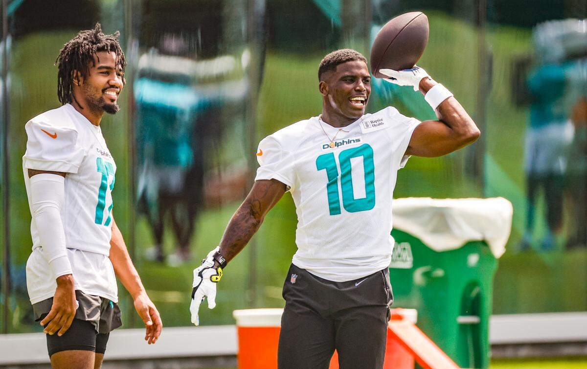Miami Dolphins wide receivers Jaylen Waddle (17) and Tyreek Hill (10) arrive for mandatory minicamp at the Baptist Health Training Complex in Miami Miami Gardens, Florida on Tuesday, June 10, 2025